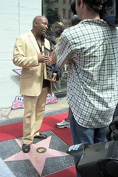 John talks to the press